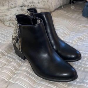 Black ankle booties with snake print